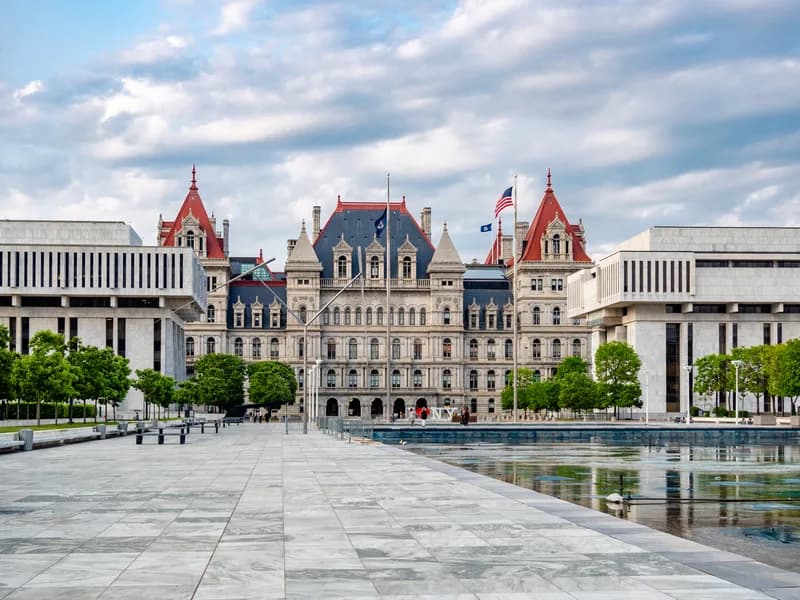 The New York State Capitol building in Albany seen from a nearby street