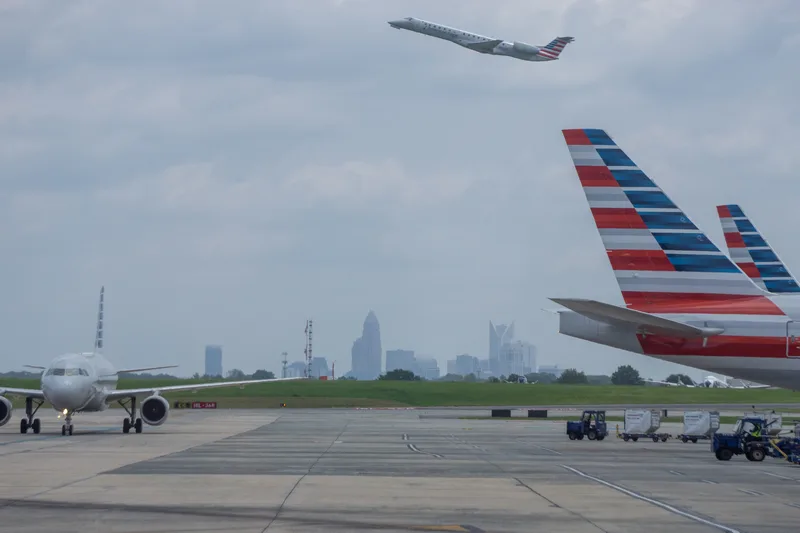 An American Airlines jet at an airport gate