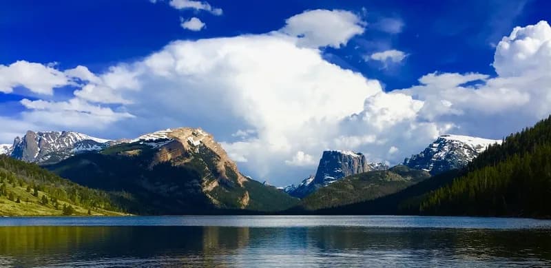 Peaks of Wyoming's Wind River Range above a small alpine lake